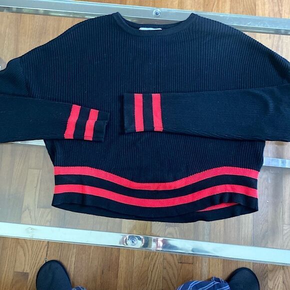 Black ribbed crewneck knit. Red accent stripes at waist and wrist - Picture 1 of 8